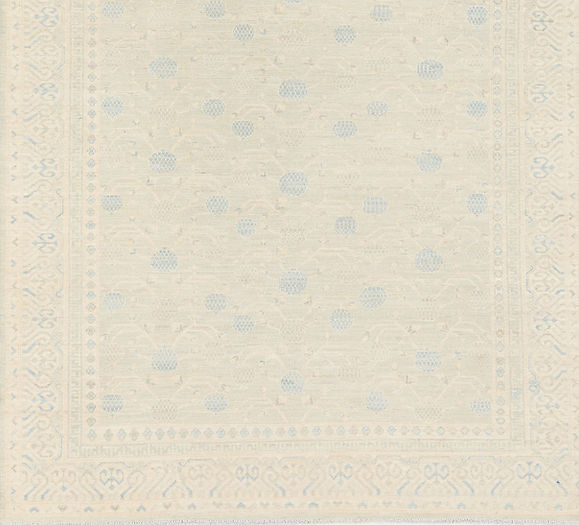 5.11 x 8.6 ft Hand Knotted Fine Khotan Rug