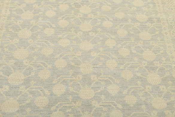 4.11 x 6.9 ft Hand Knotted Khotan Rug